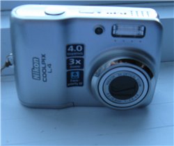 Лида фотоаппарат вот он, у меня не такой мощный как у Наташи , Nikon coolpix l4 всего 4pi(megapixel...