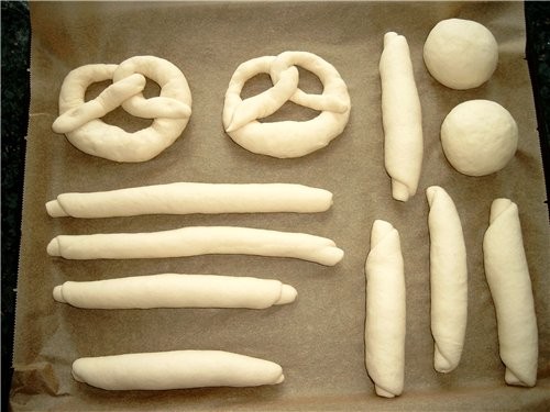 Brezel(врецель, крендель), Brezelstange(палочки) und Brezelsemmel(булочки) относятся к Laugengebдck... - 3